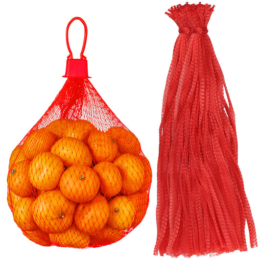 A bunch of plastic net bags and one with a bunch of oranges inside a net bag